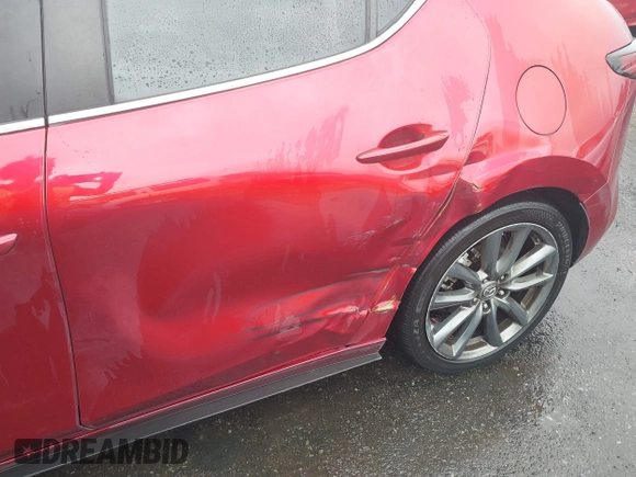 2019 Mazda 3 Preferred z VIN JM1BPAMM2K1135386, wystawiony jako IAAI lot #40367062 z przebiegiem 9 999 mil mil oraz . Historia ofert i sprzedaży dostępna na DreamBid. Obrazek 6.