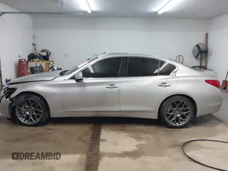 2014 Infiniti Q50 Sport with VIN JN1BV7AR0EM695972, listed as a IAAI auction lot 41732229 with 134,654 mi miles and . Bid and sale history available at DreamBid. Image 15.