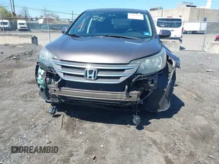 2014 Honda CR-V EX with VIN 2HKRM4H50EH628721, listed as a IAAI auction lot 42064143 with 103,009 mi miles and . Bid and sale history available at carsss.com. Image 6.