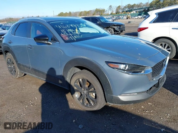 2023 Mazda CX-30 S Carbon Edition with VIN 3MVDMBCM3PM579345, listed as a IAAI auction lot 41689892 with 18,621 mi miles and . Bid and sale history available at DreamBid. Image 1.