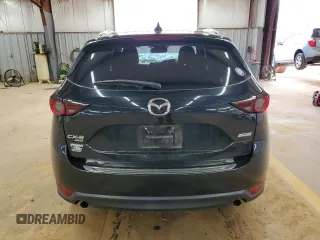 2019 Mazda CX-5 Touring with VIN JM3KFBCM4K0571793, listed as a Copart auction lot 49696825 with 97,305 mi miles and Salvage Title. Bid and sale history available at carsss.com. Image 6.