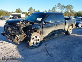 2015 Chevrolet Silverado 1500 LTZ with VIN 3GCUKSEJXFG489780, listed as a IAAI auction lot 41335608 with 140,972 mi miles. Bid and sale history available at carsss.com. Image 17.