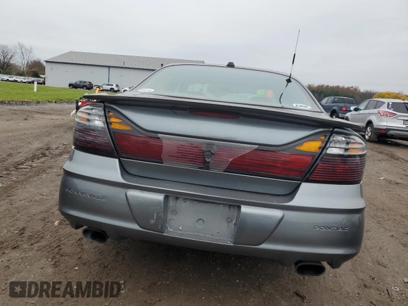 2004 Pontiac Bonneville SLE z VIN 1G2HY52K24U164098, wystawiony jako Copart lot #82283344 z przebiegiem 132 456 mil mil oraz Szkoda całkowita • Salvage title. Historia ofert i sprzedaży dostępna na DreamBid. Obrazek 6.
