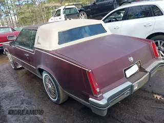 1982 Cadillac Eldorado z VIN 1G6AL578XCE604086, wystawiony jako IAAI lot #41676376 z przebiegiem 102 650 mil mil oraz . Historia ofert i sprzedaży dostępna na DreamBid. Obrazek 3.