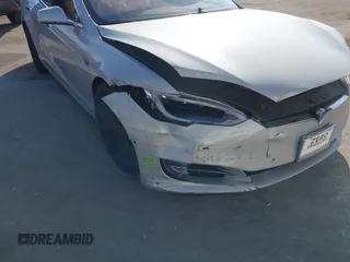 2016 Tesla Model S 90D с VIN 5YJSA1E23GF144496, выставлен на аукционе IAAI как лот 41372621 с пробегом 34 832 миль миль и . История ставок и продаж доступна на DreamBid. Изображение 6.
