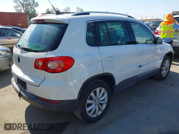 2011 Volkswagen Tiguan SEL with VIN WVGBV7AXXBW554267, listed as a IAAI auction lot 42773354 with 70,547 mi miles and . Bid and sale history available at DreamBid. Image 4.