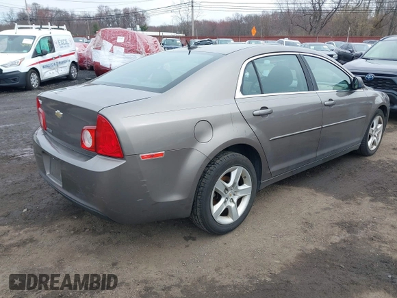 2011 Chevrolet Malibu 1LS with VIN 1G1ZB5E18BF251602, listed as a IAAI auction lot 41880910 with 76,049 mi miles and . Bid and sale history available at DreamBid. Image 4.