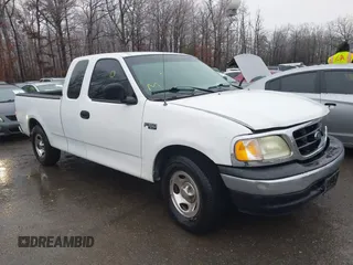 2004 Ford F-150 Heritage XL with VIN 2FTRX17224CA98804, listed as a IAAI auction lot 41505287 with 268,053 mi miles. Bid and sale history available at carsss.com. Image 1.