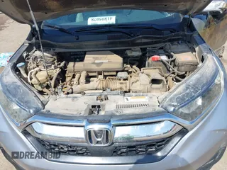 2018 Honda CR-V EX with VIN 7FARW2H59JE059539, listed as a IAAI auction lot 41895078 with 132,631 mi miles and . Bid and sale history available at DreamBid. Image 10.