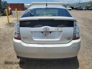 2006 Toyota Prius with VIN JTDKB22U167521985, listed as a Copart auction lot 54974335 with 128,541 mi miles and Clean Title. Bid and sale history available at carsss.com. Image 6.
