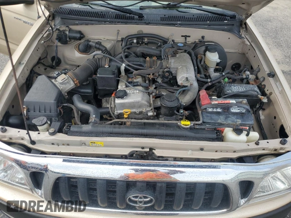 2002 Toyota Tacoma with VIN 5TEWM72N12Z093226, listed as a Copart auction lot 61019955 with 103,657 mi miles and Clean title. Bid and sale history available at DreamBid. Image 11.