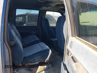 1994 GMC Suburban with VIN 1GKEC16K2RJ721119, listed as a IAAI auction lot 41075175 with 344,904 mi miles. Bid and sale history available at carsss.com. Image 8.