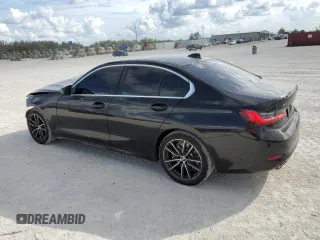 2021 BMW 3 Series 330i xDrive with VIN WBA5R7C08MFJ94101, listed as a Copart auction lot 86703334 with 51,533 mi miles and Salvage Title. Bid and sale history available at carsss.com. Image 2.