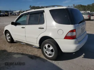 2005 Mercedes-Benz M-Class 3.7L with VIN 4JGAB57E55A559036, listed as a Copart auction lot 83024234 with 164,454 mi miles and Salvage Title. Bid and sale history available at carsss.com. Image 2.