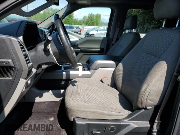 2015 Ford F-150 XLT with VIN 1FTEW1EP7FKE12574, listed as a Copart auction lot 59519985 with 133,337 mi miles and Salvage title. Bid and sale history available at DreamBid. Image 7.
