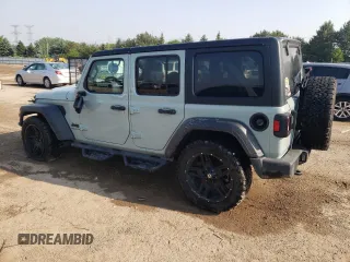 2023 Jeep Wrangler Willys with VIN 1C4HJXDG9PW615072, listed as a Copart auction lot 59606805 with 72,969 mi miles and Salvage title. Bid and sale history available at DreamBid. Image 2.