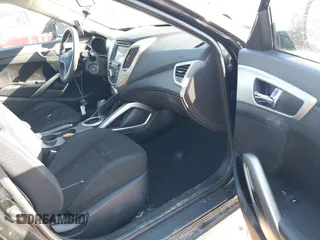 2016 Hyundai Veloster z VIN KMHTC6AD1GU262391, wystawiony jako IAAI lot #41649087 z przebiegiem 96 104 mil mil oraz . Historia ofert i sprzedaży dostępna na DreamBid. Obrazek 5.