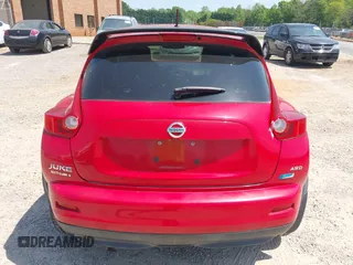 2014 Nissan Juke SL with VIN JN8AF5MV7ET483065, listed as a IAAI auction lot 42076991 with 66,899 mi miles. Bid and sale history available at carsss.com. Image 6.