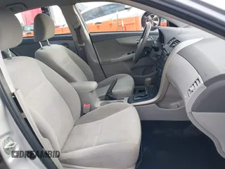 2009 Toyota Corolla with VIN 1NXBU40E39Z131392, listed as a IAAI auction lot 41194018 with 136,031 mi miles. Bid and sale history available at carsss.com. Image 5.