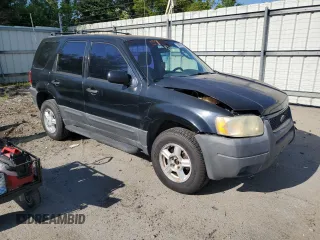 2004 Ford Escape XLS с VIN 1FMYU02194KB20656, выставлен на аукционе Copart как лот 54820755 с пробегом 107 447 миль миль и Списание • Salvage title. История ставок и продаж доступна на DreamBid. Изображение 4.