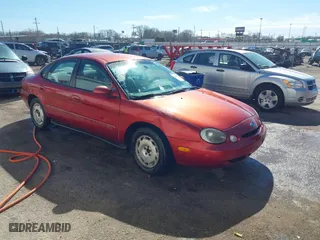 1997 Ford Taurus GL with VIN 1FALP52U2VA207986, listed as a IAAI auction lot 41606014 with 225,124 mi miles. Bid and sale history available at carsss.com. Image 1.