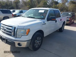 2012 Ford F-150 XL with VIN 1FTFW1CF9CFA94640, listed as a IAAI auction lot 41703729 with 216,291 mi miles. Bid and sale history available at carsss.com. Image 21.