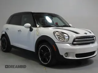 2016 MINI Countryman with VIN WMWZB3C51GWM33437, listed as a Copart auction lot 54439695 with 104,381 mi miles and Salvage title. Bid and sale history available at DreamBid. Image 1.