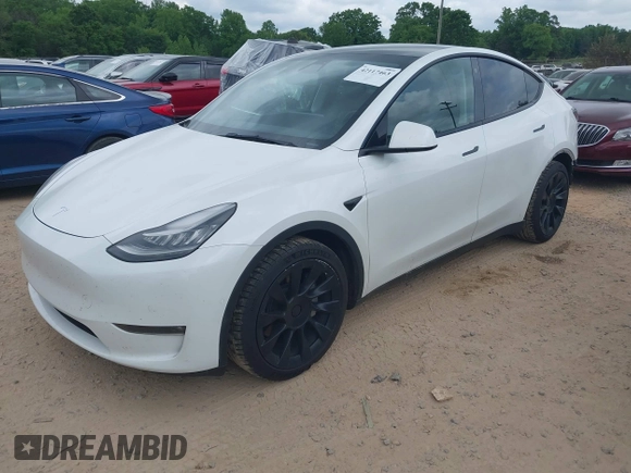 2021 Tesla Model Y Long Range with VIN 5YJYGDEE7MF198867, listed as a IAAI auction lot 42117463 with 79,759 mi miles and . Bid and sale history available at DreamBid. Image 19.
