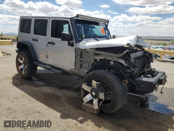 2012 Jeep Wrangler Unlimited Altitude with VIN 1C4HJWEG8CL163653, listed as a Copart auction lot 55279045 with 107,076 mi miles and Salvage title. Bid and sale history available at DreamBid. Image 4.