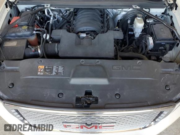 2015 GMC Yukon Denali with VIN 1GKS2CKJ7FR266750, listed as a Copart auction lot 47882125 with 121,705 mi miles and Salvage Title. Bid and sale history available at carsss.com. Image 13.