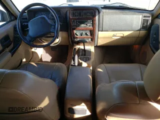 2000 Jeep Cherokee Limited with VIN 1J4FF68S0YL250926, listed as a Copart auction lot 84837244 with 141,020 mi miles and Salvage Title. Bid and sale history available at carsss.com. Image 8.