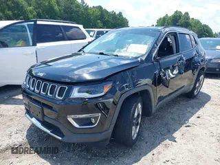 2018 Jeep Compass Limited with VIN 3C4NJDCBXJT332524, listed as a IAAI auction lot 42618421 with 61,854 mi miles and . Bid and sale history available at DreamBid. Image 2.