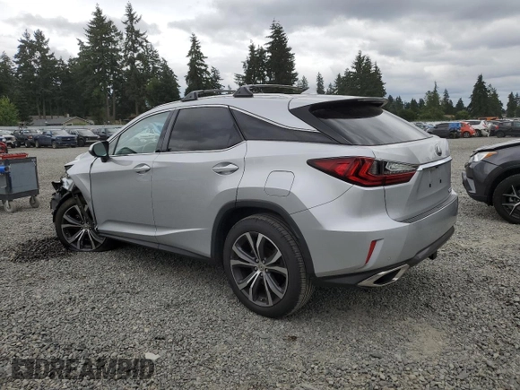 2016 Lexus RX 350 with VIN JTJBZMCA5G2005796, listed as a Copart auction lot 64453905 with 69,784 mi miles and Salvage title. Bid and sale history available at DreamBid. Image 2.