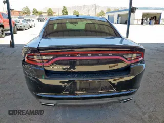 2015 Dodge Charger SE z VIN 2C3CDXBGXFH716742, wystawiony jako Copart lot #60039165 z przebiegiem 153 278 mil mil oraz Szkoda całkowita • Salvage title. Historia ofert i sprzedaży dostępna na DreamBid. Obrazek 6.