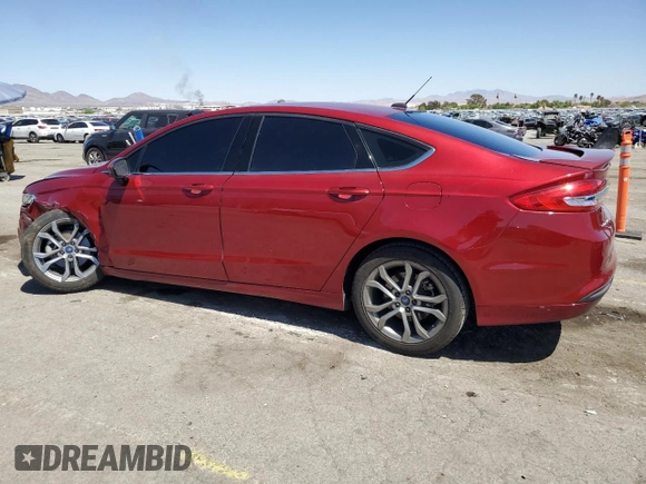 2017 Ford Fusion SE z VIN 3FA6P0H77HR413851, wystawiony jako Copart lot #51806965 z przebiegiem 98 269 mil mil oraz Szkoda całkowita • Salvage title. Historia ofert i sprzedaży dostępna na DreamBid. Obrazek 2.
