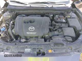 2014 Mazda 3 i Touring z VIN JM1BM1V75E1113050, wystawiony jako IAAI lot #42374782 z przebiegiem 94 571 mil mil oraz . Historia ofert i sprzedaży dostępna na DreamBid. Obrazek 10.