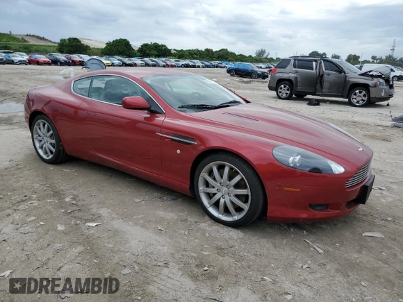 2005 Aston Martin DB9 z VIN SCFAD01A15GA00012, wystawiony jako Copart lot #65919164 z przebiegiem Nie podano mil oraz Szkody całkowita. Historia ofert i sprzedaży dostępna na DreamBid. Obrazek 4.