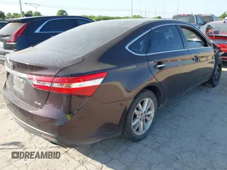 2013 Toyota Avalon XLE with VIN 4T1BK1EB6DU039057, listed as a IAAI auction lot 42011057 with 127,313 mi miles and . Bid and sale history available at DreamBid. Image 4.