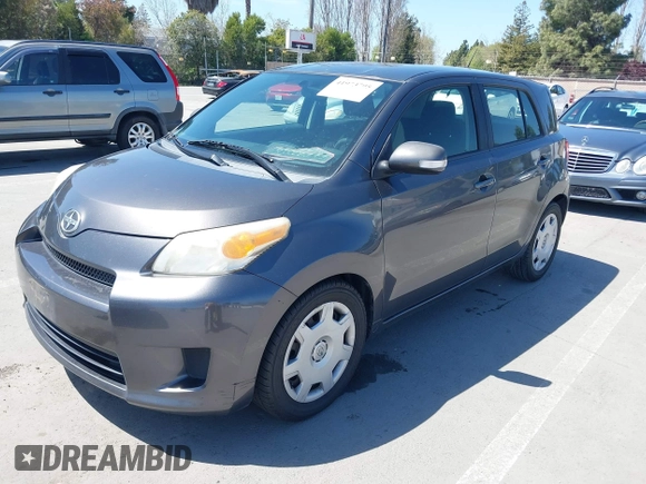 2008 Scion xD with VIN JTKKU10438J027228, listed as a IAAI auction lot 41973795 with 205,044 mi miles. Bid and sale history available at carsss.com. Image 2.