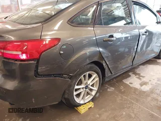 2016 Ford Focus SE with VIN 1FADP3F20GL234077, listed as a IAAI auction lot 41933546 with 106,184 mi miles and . Bid and sale history available at DreamBid. Image 6.