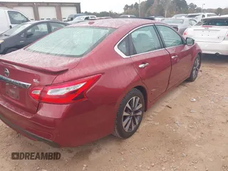 2016 Nissan Altima SV with VIN 1N4AL3AP6GC287139, listed as a IAAI auction lot 40699745 with 54,675 mi miles and . Bid and sale history available at DreamBid. Image 4.