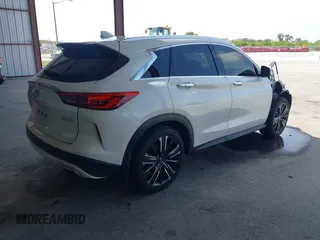 2021 Infiniti QX50 Luxe with VIN 3PCAJ5BA2MF112939, listed as a IAAI auction lot 42191494 with 25,076 mi miles and . Bid and sale history available at DreamBid. Image 4.