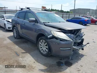 2008 Mazda CX-9 Grand Touring z VIN JM3TB38AX80141604, wystawiony jako IAAI lot #42069685 z przebiegiem 153 620 mil mil oraz . Historia ofert i sprzedaży dostępna na DreamBid. Obrazek 1.