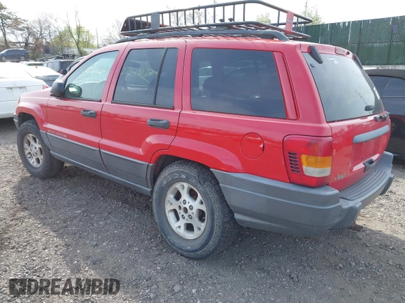 2001 Jeep Grand Cherokee Laredo with VIN 1J4GX48SX1C522670, listed as a IAAI auction lot 42111708 with Not provided miles and . Bid and sale history available at DreamBid. Image 3.