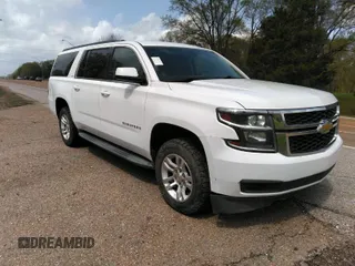 2015 Chevrolet Suburban LT with VIN 1GNSCJKC6FR229260, listed as a IAAI auction lot 41974363 with 251,395 mi miles. Bid and sale history available at carsss.com. Image 1.