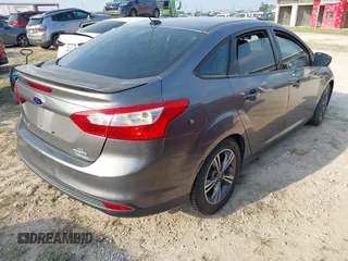 2014 Ford Focus SE with VIN 1FADP3F24EL320991, listed as a IAAI auction lot 41932638 with 133,163 mi miles. Bid and sale history available at carsss.com. Image 4.