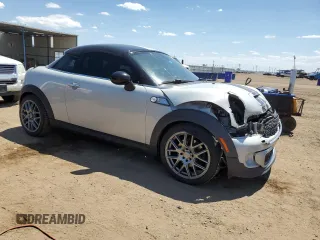 2012 MINI Coupe S z VIN WMWSX3C53CT155039, wystawiony jako Copart lot #56140175 z przebiegiem 114 339 mil mil oraz Nie do naprawy • Non repairable. Historia ofert i sprzedaży dostępna na DreamBid. Obrazek 4.