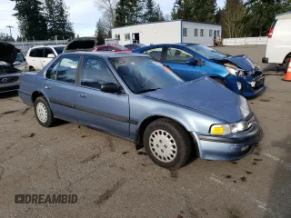 1990 Honda Accord LX with VIN JHMCB7657LC094933, listed as a Copart auction lot 42030575 with 156,426 mi miles and Salvage Title. Bid and sale history available at carsss.com. Image 4.