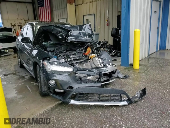 2017 BMW X1 xDrive28i z VIN WBXHT3Z39H4A57395, wystawiony jako Copart lot #56357845 z przebiegiem Nie podano mil oraz Szkoda całkowita • Salvage title. Historia ofert i sprzedaży dostępna na DreamBid. Obrazek 14.
