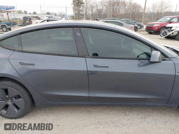 2023 Tesla Model 3 with VIN 5YJ3E1EA5PF474382, listed as a IAAI auction lot 41764268 with 31,040 mi miles and . Bid and sale history available at DreamBid. Image 12.